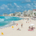 Is puerto vallarta or cancun warmer?